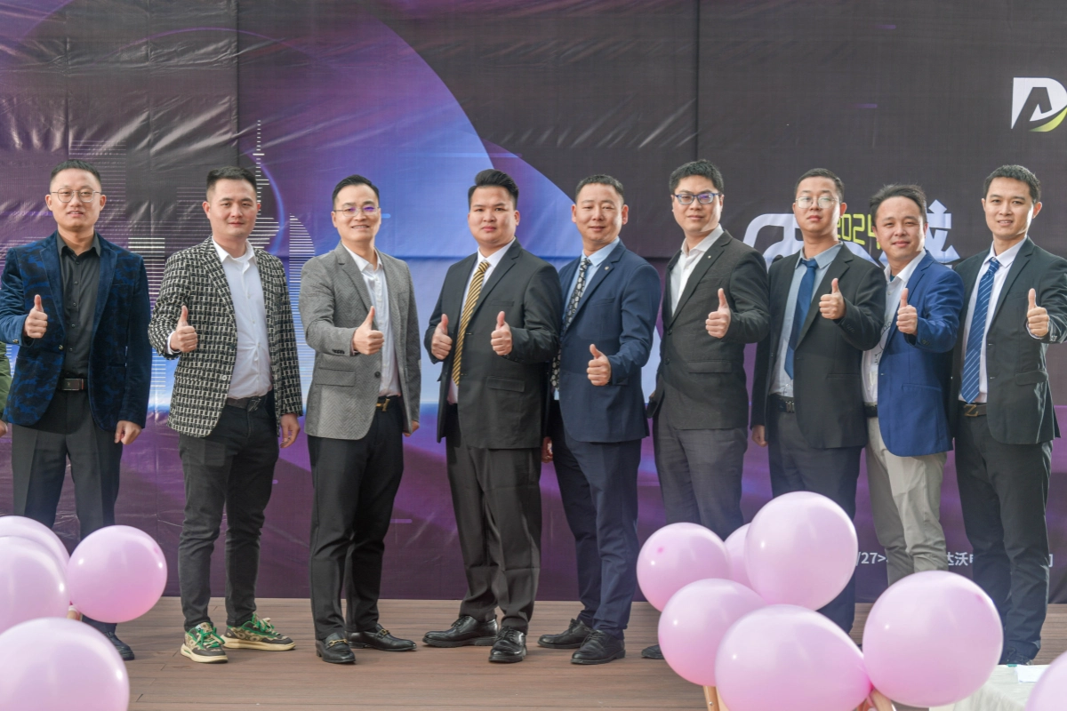 Male colleagues from DAVOLIN posing for a group photo during the company’s 2024 annual celebration event
