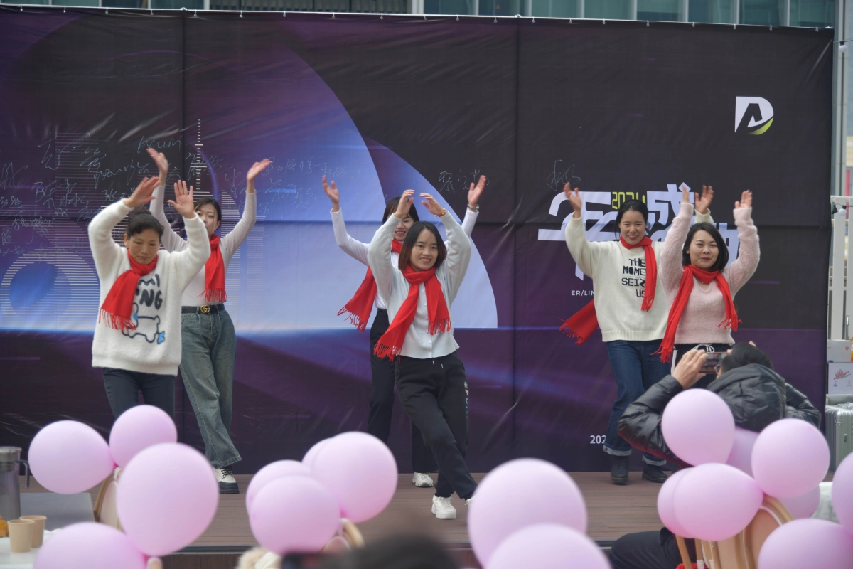 Women from the DAVOLIN team performing a dance during the company’s 2024 annual celebration event