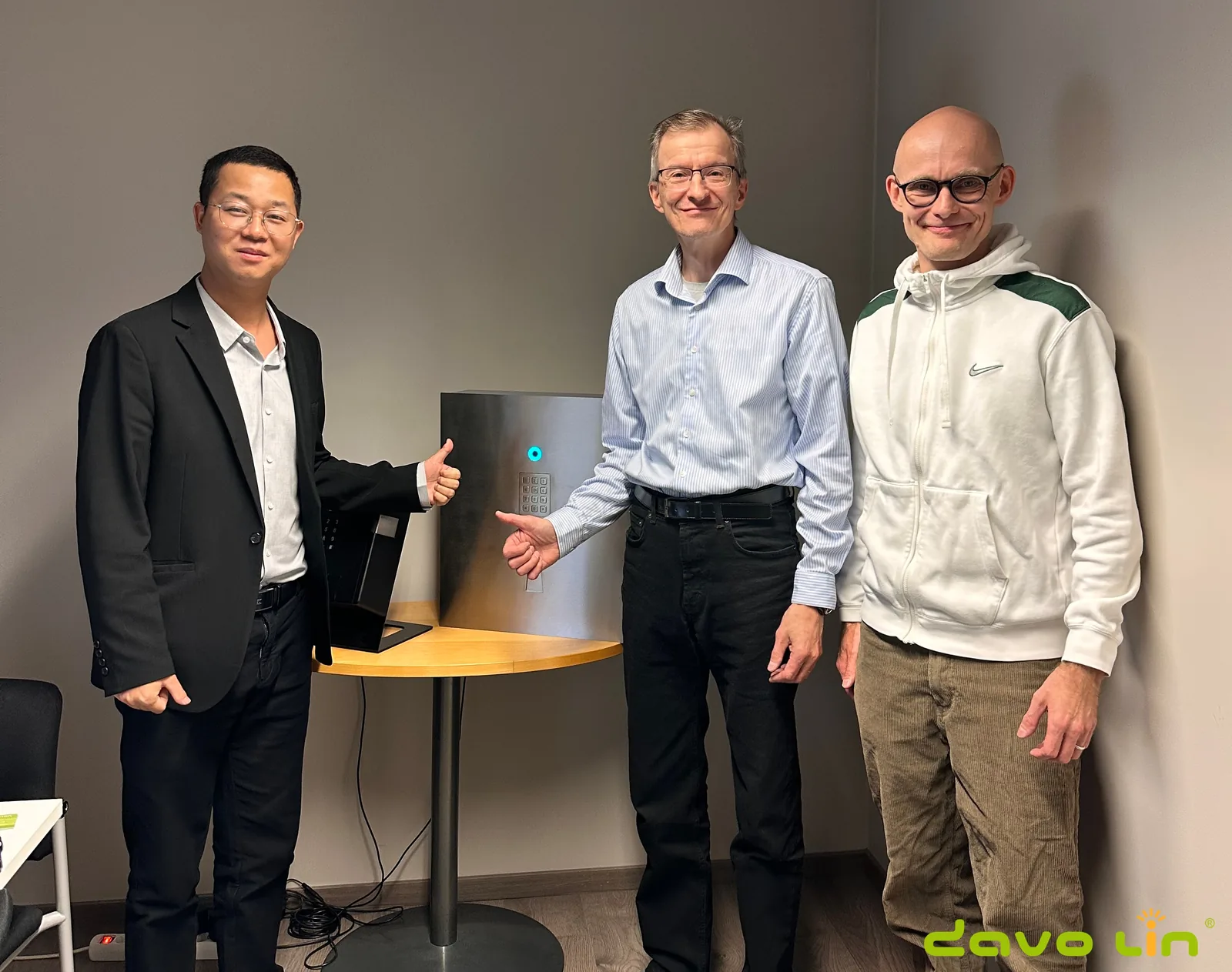 Project team beside completed smart key management equipment