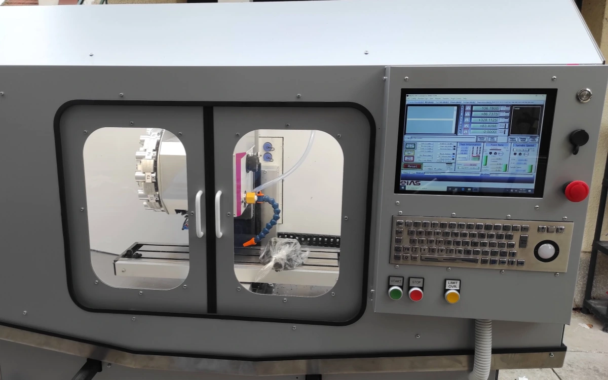 Industrial keyboard integrated into a CNC machine control panel
